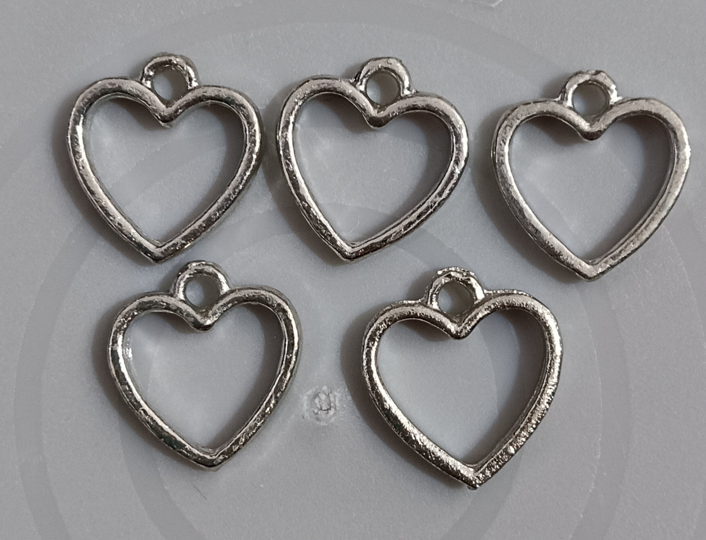 Mini silver heart bezel pack of 5