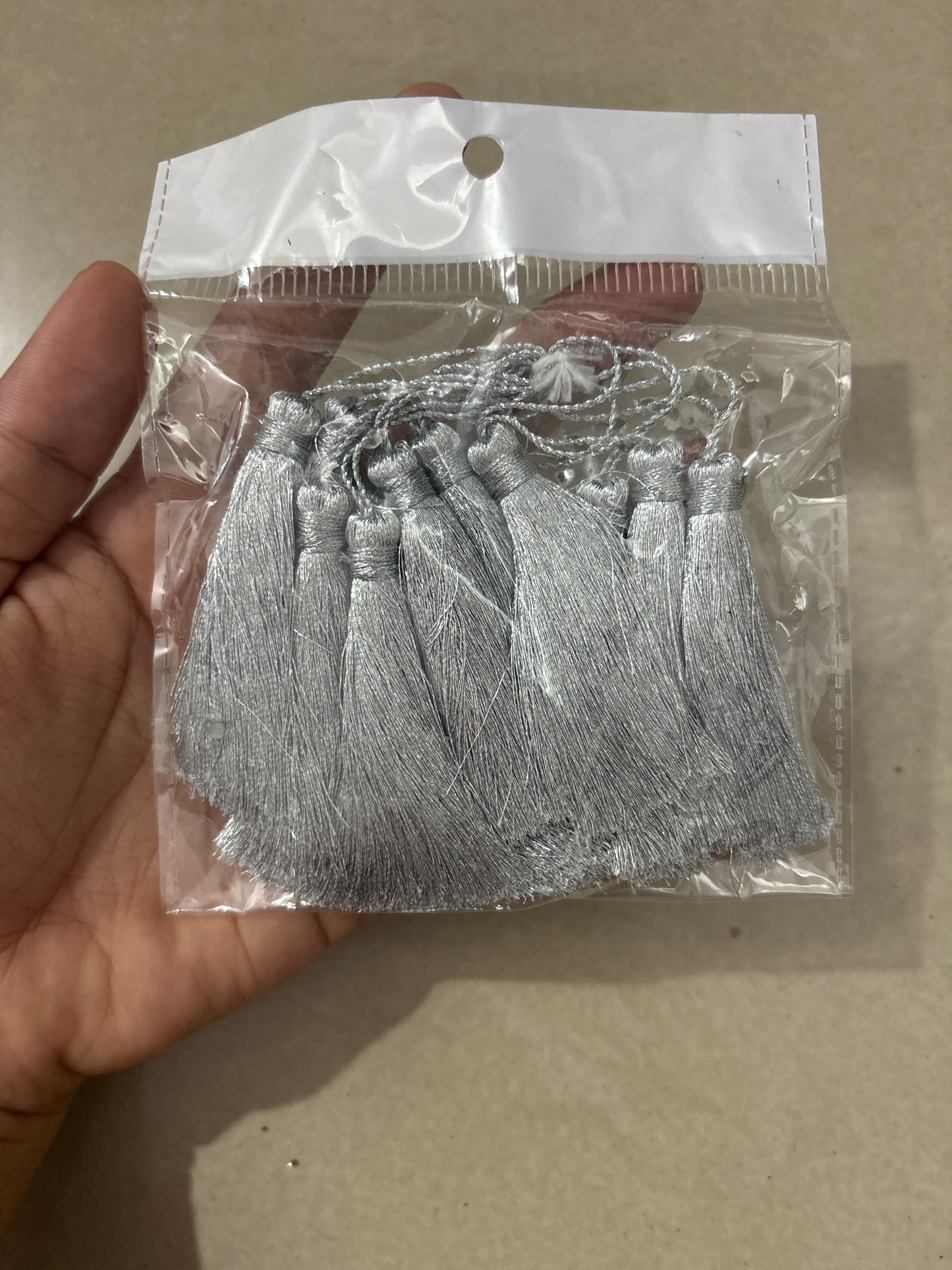 Silver tassels
